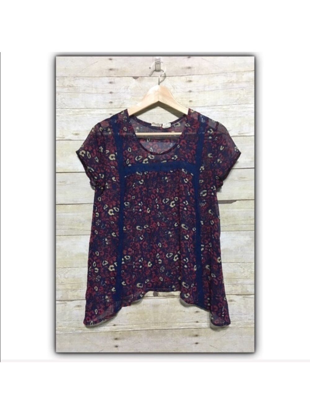 MUDD abstract animal print shark bite hem top size S